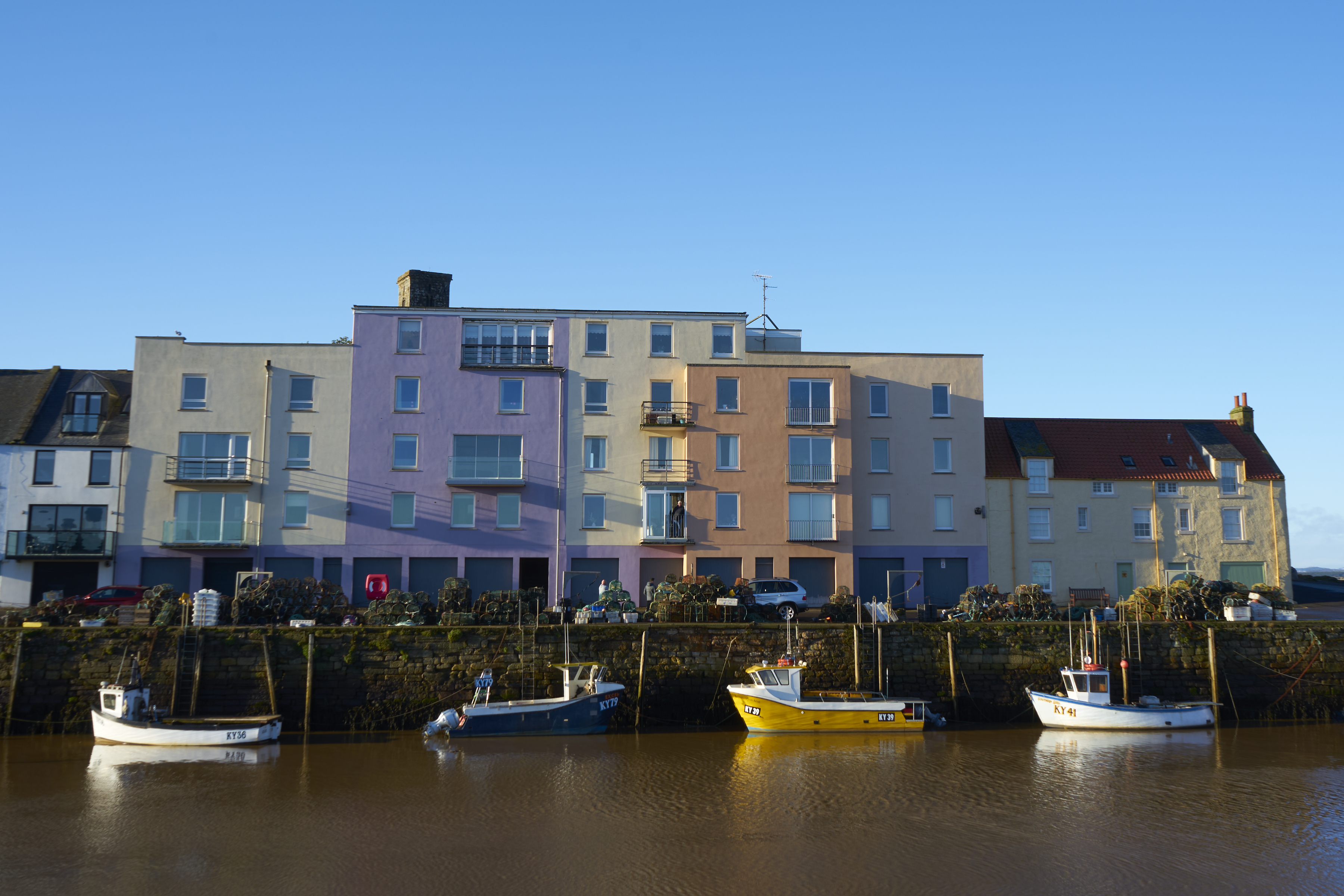 st andrews harbour colourful houses